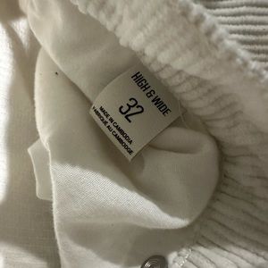 White corduroy pants from Urban Outfitters, sized 32